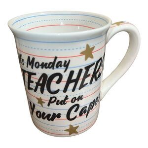 Our Name is Mud “Teachers Put on Your Capes” mug Features notebook paper design